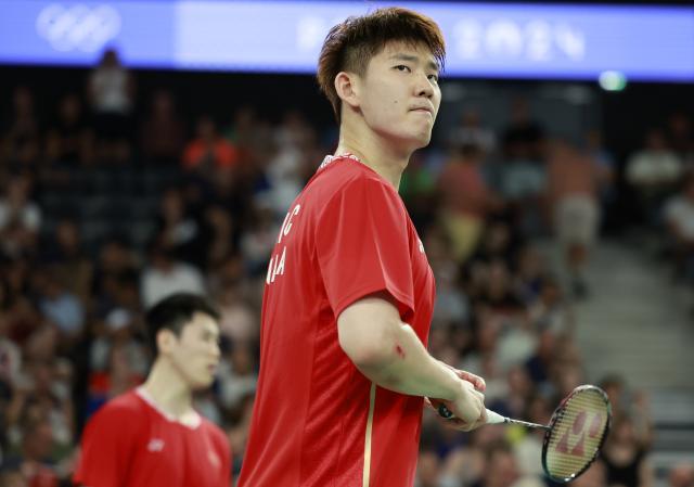 1724379410761074706.jpg 巴黎奥运会丨羽毛球——男双小组赛:刘雨辰_欧烜屹不敌丹麦组合XxjpseC007069_20240730_MVPFN0A001.jpg